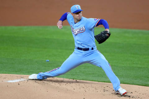 ARLINGTON, TEXAS – JULY 26: Corey Kluber (28) of the Texas Rangers pitches against the Colorado Rockies in the top of the first inning at Globe Life Field on July 26, 2020. (Photo by Tom Pennington/Getty Images)