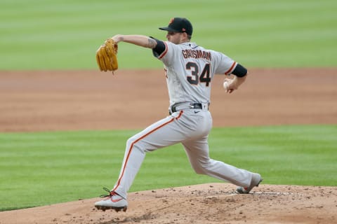 DENVER, COLORADO – AUGUST 04: Starting pitcher Kevin Gausman #34 of the SF Giants throws a pitch in the first inning against the Colorado Rockies at Coors Field on August 04, 2020, in Denver, Colorado. (Photo by Matthew Stockman/Getty Images)