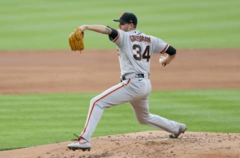 DENVER, COLORADO – AUGUST 04: Starting pitcher Kevin Gausman #34 of the San Francisco Giants throws a pitch in the first inning against the Colorado Rockies at Coors Field on August 04, 2020 in Denver, Colorado. (Photo by Matthew Stockman/Getty Images)