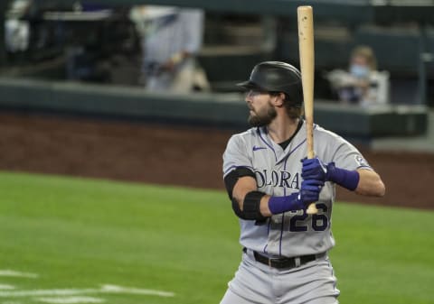 The Colorado Rockies non-tendered outfielder David Dahl will be an intriguing bounce-back candidate this offseason. (Photo by Stephen Brashear/Getty Images)