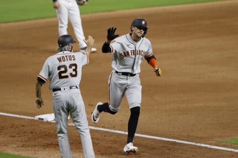 HOUSTON, TEXAS – AUGUST 11: Hunter Pence #8 of the San Francisco Giants rounds third after a three-run home run in the seventh inning against the Houston Astros at Minute Maid Park on August 11, 2020 in Houston, Texas. (Photo by Tim Warner/Getty Images)