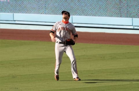 LOS ANGELES, CA – AUGUST 8: Austin Slater #13 of the SF Giants plays right field during the game against the Los Angeles Dodgers at Dodger Stadium on August 8, 2020, in Los Angeles, California. The Giants defeated the Dodgers 5-4. (Photo by Rob Leiter/MLB Photos via Getty Images)