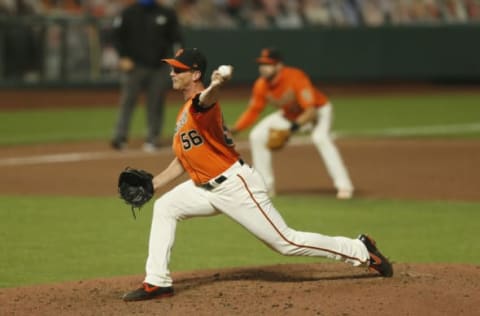 SAN FRANCISCO, CALIFORNIA – AUGUST 21: Tony Watson #56 of the San Francisco Giants pitches in the top of the eighth inning against the Arizona Diamondbacks at Oracle Park on August 21, 2020 in San Francisco, California. (Photo by Lachlan Cunningham/Getty Images)