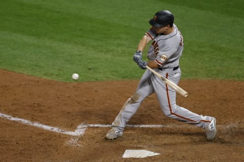 Alex Dickerson #12 of the SF Giants bats during the fifth inning against the Colorado Rockies at Coors Field on September 1, 2020. (Photo by Justin Edmonds/Getty Images)