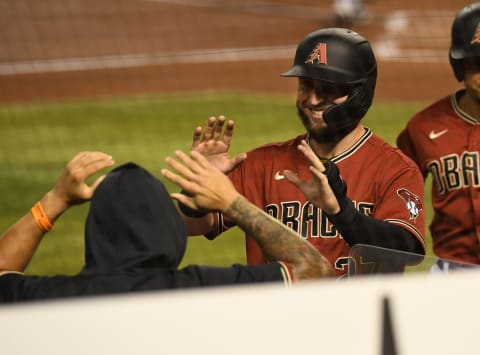 PHOENIX, ARIZONA – SEPTEMBER 09: Wyatt Mathisen #27 of the Arizona Diamondbacks runs back to the dugout after scoring a run against the Los Angeles Dodgers during the second inning Chase Field on September 09, 2020. Mathisen signed with the SF Giants this week. (Photo by Norm Hall/Getty Images)