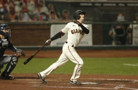 SAN FRANCISCO, CALIFORNIA – SEPTEMBER 09: Mike Yastrzemski #5 of the SF Giants hits a three-run home run in the bottom of the third inning against the Seattle Mariners at Oracle Park on September 09, 2020 in San Francisco, California. (Photo by Lachlan Cunningham/Getty Images)