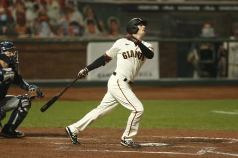 Mike Yastrzemski #5 of the SF Giants hits a three-run home run in the bottom of the third inning against the Seattle Mariners at Oracle Park on September 09, 2020. (Photo by Lachlan Cunningham/Getty Images)