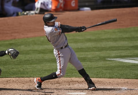 Wilmer Flores of the SF Giants bats against the Oakland Athletics in the top of the sixth inning at RingCentral Coliseum on September 19, 2020. (Photo by Thearon W. Henderson/Getty Images)