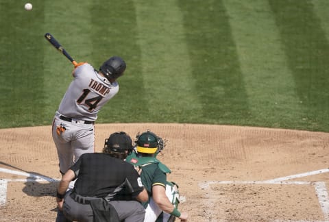 Chadwick Tromp #14 of the SF Giants hits a base hit against the Oakland Athletics in the top of the fifth inning at RingCentral Coliseum on September 20, 2020. (Photo by Thearon W. Henderson/Getty Images)