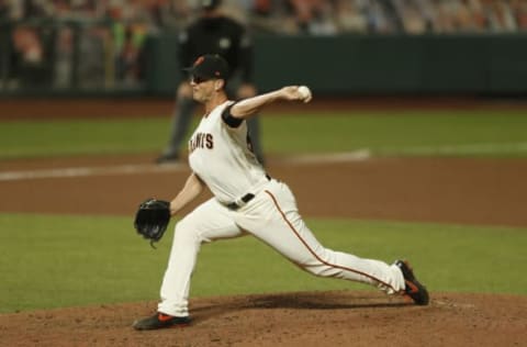 SAN FRANCISCO, CALIFORNIA – SEPTEMBER 22: Tony Watson #56 of the San Francisco Giants pitches against the Colorado Rockies at Oracle Park on September 22, 2020, in San Francisco, California. (Photo by Lachlan Cunningham/Getty Images)