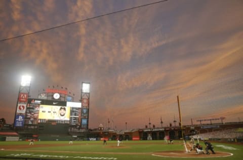 SAN FRANCISCO, CALIFORNIA – SEPTEMBER 26: Eric Hosmer #30 of the San Diego Padres hits a single in the top of the fourth inning against the SF Giants at Oracle Park on September 26, 2020 in San Francisco, California. (Photo by Lachlan Cunningham/Getty Images)