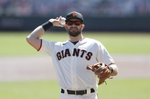 SAN FRANCISCO, CALIFORNIA – SEPTEMBER 24: Evan Longoria #10 of the SF Giants looks on during the game against the Colorado Rockies at Oracle Park on September 24, 2020 in San Francisco, California. (Photo by Lachlan Cunningham/Getty Images)