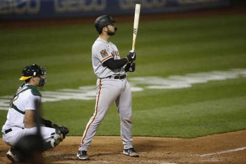 OAKLAND, CA – SEPTEMBER 18: Joey Bart #21 of the San Francisco Giants bats during the game against the Oakland Athletics at RingCentral Coliseum on September 18, 2020 in Oakland, California. The Athletics defeated the Giants 6-0. (Photo by Michael Zagaris/Oakland Athletics/Getty Images)