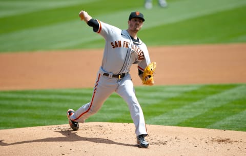 Kevin Gausman #34 of the SF Giants pitches during the game against the Oakland Athletics at RingCentral Coliseum on September 19, 2020. (Photo by Michael Zagaris/Oakland Athletics/Getty Images)