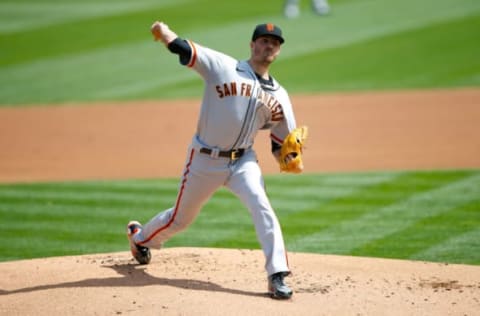 OAKLAND, CA – SEPTEMBER 19: Kevin Gausman #34 of the San Francisco Giants pitches during the game against the Oakland Athletics at RingCentral Coliseum on September 19, 2020, in Oakland, California. The Athletics defeated the Giants 6-0. (Photo by Michael Zagaris/Oakland Athletics/Getty Images)