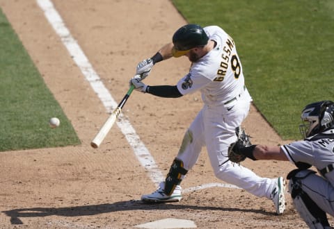 Robbie Grossman #8 of the Oakland Athletics bats against the Chicago White Sox during the seventh inning of the Wild Card Round Game One at RingCentral Coliseum on September 29, 2020 in Oakland, California. (Photo by Thearon W. Henderson/Getty Images)