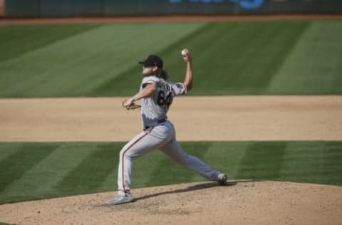 OAKLAND, CA – SEPTEMBER 20: Shaun Anderson #64 of the San Francisco Giants pitches during the game against the Oakland Athletics at RingCentral Coliseum on September 20, 2020 in Oakland, California. The Giants defeated the Athletics 14-2. (Photo by Michael Zagaris/Oakland Athletics/Getty Images)