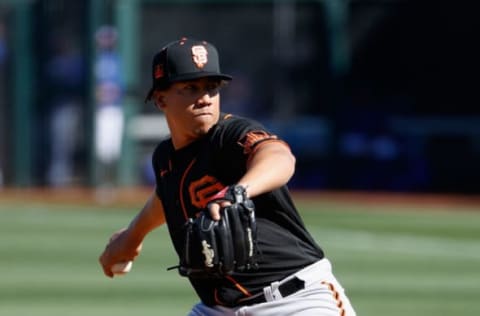 SF Giants Relief pitcher Dedniel Núñez #43 of the SF Giants pitches against the Texas Rangers during the fourth inning of the MLB spring training game on March 01, 2021 in Surprise, Arizona. (Photo by Christian Petersen/Getty Images)