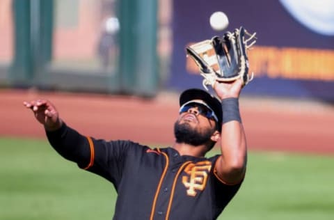 Heliot Ramos #80 of the SF Giants makes a catch during the sixth inning of a spring training game against the Chicago White Sox at Scottsdale Stadium on March 04, 2021 in Scottsdale, Arizona. (Photo by Carmen Mandato/Getty Images)