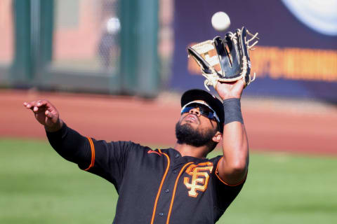 Heliot Ramos #80 of the SF Giants makes a catch during the sixth inning of a spring training game against the Chicago White Sox at Scottsdale Stadium on March 04, 2021. (Photo by Carmen Mandato/Getty Images)