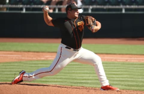 SCOTTSDALE, ARIZONA – MARCH 28: Kervin Castro #76 of the SF Giants pitches in the sixth inning against the Oakland Athletics during the MLB spring training game at Scottsdale Stadium on March 28, 2021 in Scottsdale, Arizona. (Photo by Abbie Parr/Getty Images)