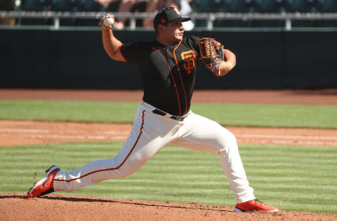 SCOTTSDALE, ARIZONA – MARCH 28: Kervin Castro #76 of the SF Giants pitches in the sixth inning against the Oakland Athletics during the MLB spring training game at Scottsdale Stadium on March 28, 2021 in Scottsdale, Arizona. (Photo by Abbie Parr/Getty Images)