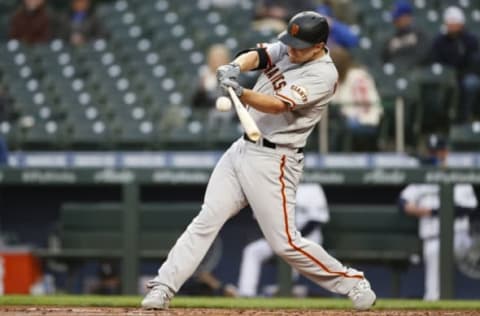 SEATTLE, WASHINGTON – APRIL 03: Alex Dickerson #12 of the San Francisco Giants at bat against the Seattle Mariners at T-Mobile Park on April 03, 2021 in Seattle, Washington. (Photo by Steph Chambers/Getty Images)