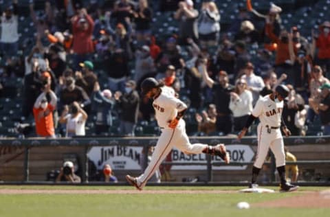 SAN FRANCISCO, CALIFORNIA – APRIL 10: Brandon Crawford #35 of the San Francisco Giants rounds the bases after he hit a three-run home run in the sixth inning against the Colorado Rockies at Oracle Park on April 10, 2021 in San Francisco, California. (Photo by Ezra Shaw/Getty Images)