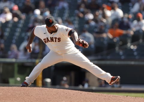 SAN FRANCISCO, CALIFORNIA – APRIL 10: Reyes Moronta #54 of the SF Giants pitches against the Colorado Rockies at Oracle Park. (Photo by Ezra Shaw/Getty Images)