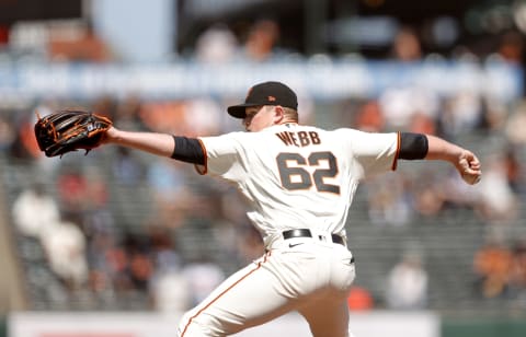 SAN FRANCISCO, CALIFORNIA – APRIL 14: Logan Webb #62 of the SF Giants pitches against the Cincinnati Reds at Oracle Park on April 14, 2021 in San Francisco, California. (Photo by Ezra Shaw/Getty Images)