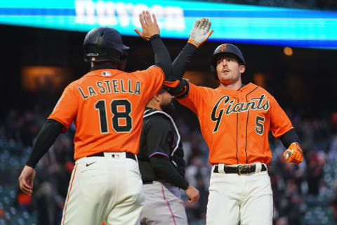 SAN FRANCISCO, CALIFORNIA – APRIL 23: Mike Yastrzemski #5 of the San Francisco Giants celebrates a two-run home run with Tommy La Stella #18 during the third inning against the Miami Marlins at Oracle Park on April 23, 2021 in San Francisco, California. (Photo by Daniel Shirey/Getty Images)