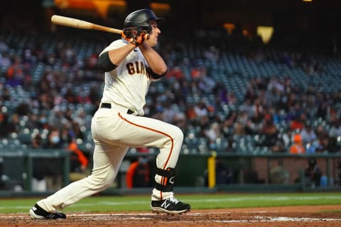 SAN FRANCISCO, CALIFORNIA – APRIL 27: Jason Vosler #32 of the SF Giants hits an RBI double during the fourth inning against the Colorado Rockies at Oracle Park. (Photo by Daniel Shirey/Getty Images)