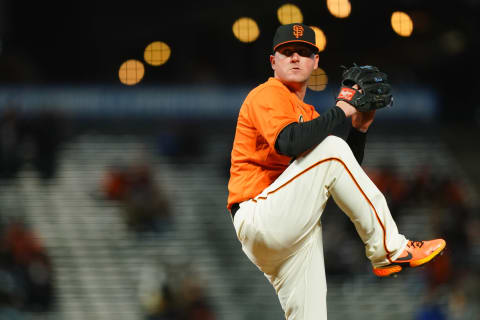 SAN FRANCISCO, CALIFORNIA – APRIL 23: Jake McGee #17 of the SF Giants pitches during the game against the Miami Marlins at Oracle Park on April 23, 2021. (Photo by Daniel Shirey/Getty Images)