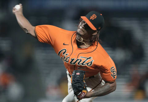 SAN FRANCISCO, CALIFORNIA – MAY 07: Camilo Doval #75 of the San Francisco Giants pitches against the San Diego Padres in the seventh inning at Oracle Park on May 07, 2021 in San Francisco, California. The Giants won the game 5-4. (Photo by Thearon W. Henderson/Getty Images)