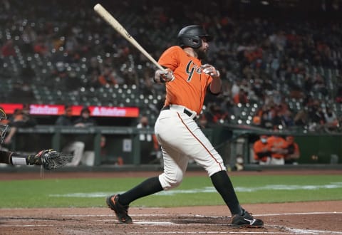 SAN FRANCISCO, CALIFORNIA – MAY 07: Brandon Belt #9 of the SF Giants bats against the San Diego Padres in the fifth inning at Oracle Park on May 07, 2021 in San Francisco, California. (Photo by Thearon W. Henderson/Getty Images)