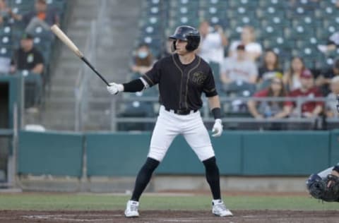 SACRAMENTO, CALIFORNIA – MAY 27: Drew Robinson #5 of the Sacramento River Cats bats against the Las Vegas Aviators in the third inning at Sutter Health Park on May 27, 2021 in Sacramento, California. Robinson attempted suicide on April 16, 2020 by shooting himself in the temple. Although he lost vision in one of his eyes, he has been able to make a full recovery. (Photo by Ezra Shaw/Getty Images)