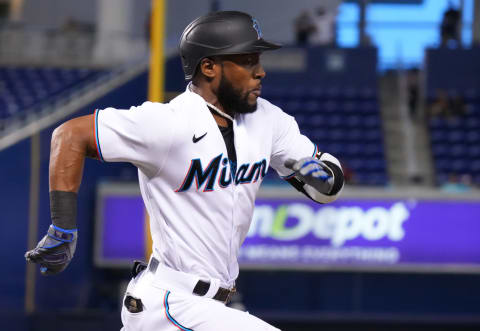 MIAMI, FLORIDA – JUNE 23: Starling Marte #6 of the Miami Marlins singles on a soft ground ball in the first inning against the Toronto Blue Jays at loanDepot park on June 23, 2021. With trade rumors swirling all around, could he be donning an SF Giants uniform soon? (Photo by Mark Brown/Getty Images)