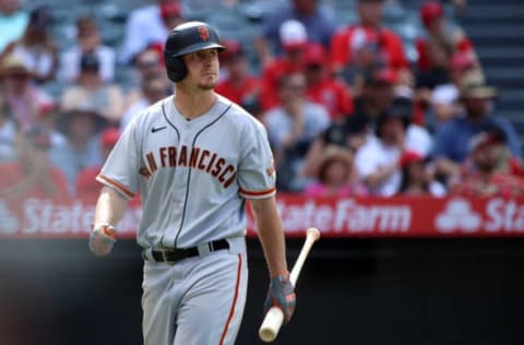 ANAHEIM, CALIFORNIA – JUNE 23: Alex Dickerson #12 of the San Francisco Giants looks on after striking out during the tenth inning against the Los Angeles Angels at Angel Stadium of Anaheim on June 23, 2021 in Anaheim, California. (Photo by Katelyn Mulcahy/Getty Images)