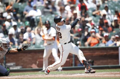 OAKLAND, CA – JUNE 27: Buster Posey #28 of the San Francisco Giants bats during the game against the Oakland Athletics at Oracle Park on June 27, 2021 in San Francisco, California. The Athletics defeated the Giants 6-2. (Photo by Michael Zagaris/Oakland Athletics/Getty Images)