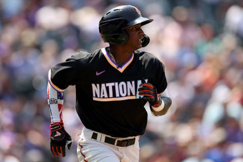 DENVER, COLORADO – JULY 11: Marco Luciano #10 of the National League plays the American League team during the MLB All-Star Futures Game at Coors Field on July 11, 2021. (Photo by Matthew Stockman/Getty Images)