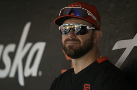 SAN FRANCISCO, CALIFORNIA – JULY 10: Evan Longoria #10 of the San Francisco Giants looks on from the dugout against the Washington Nationals in the bottom of the fifth inning at Oracle Park on July 10, 2021 in San Francisco, California. The Giants are wearing an alternate uniform called City Connect. (Photo by Thearon W. Henderson/Getty Images)