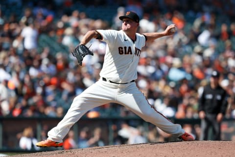 SAN FRANCISCO, CALIFORNIA – JULY 31: Jake McGee #17 of the SF Giants pitches against the Houston Astros at Oracle Park on July 31, 2021 in San Francisco, California. (Photo by Lachlan Cunningham/Getty Images)