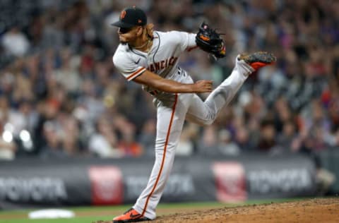 DENVER, COLORADO – SEPTEMBER 24: Camilo Doval #75 of the San Francisco Giants throws against the Colorado Rockies in the ninth inning at Coors Field on September 24, 2021 in Denver, Colorado. (Photo by Matthew Stockman/Getty Images)