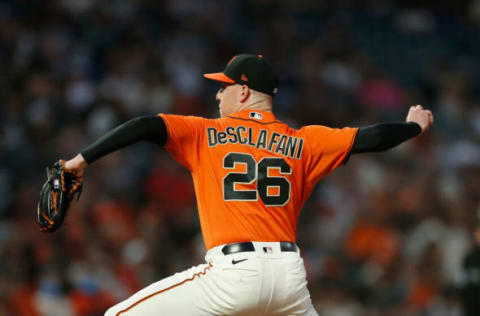 SAN FRANCISCO, CALIFORNIA – OCTOBER 01: Anthony DeSclafani #26 of the San Francisco Giants pitches in the top of the first inning against the San Diego Padres at Oracle Park on October 01, 2021 in San Francisco, California. (Photo by Lachlan Cunningham/Getty Images)