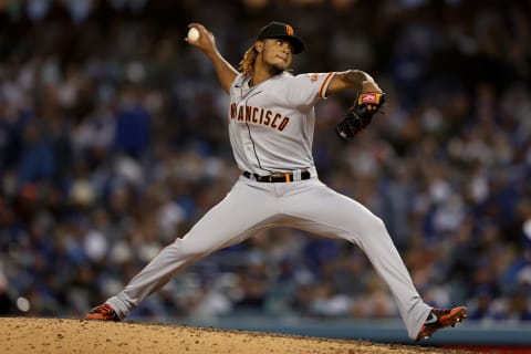 LOS ANGELES, CALIFORNIA – OCTOBER 11: Camilo Doval #75 of the SF Giants pitches against the Los Angeles Dodgers during the eighth inning in game 3 of the National League Division Series at Dodger Stadium on October 11, 2021. (Photo by Ronald Martinez/Getty Images)