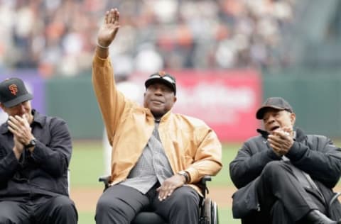 SAN FRANCISCO, CA – APRIL 06: San Francisco Giants legend Willie McCovey waves to the crowd while seating between Jeff Kent (L) and Willie Mays during a ceremony honoring Buster Posey for winning the 2012 National League MVP before the Giants game against the St. Louis Cardinals at AT&T Park on April 6, 2013 in San Francisco, California. (Photo by Ezra Shaw/Getty Images)