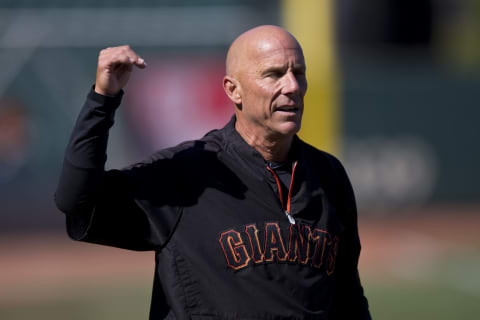 SF Giants coach Tim Flannery watches batting practice before a game in 2014. (Photo by Jason O. Watson/Getty Images)