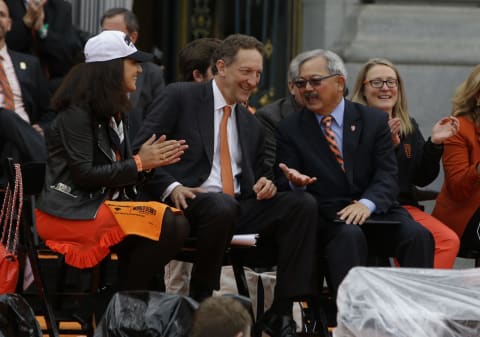 SF Giants owner Larry Baer and San Francisco Mayor Ed Lee talk during the Giants World Series victory parade on October 31, 2014 in San Francisco, California. (Photo by Jason O. Watson/Getty Images)