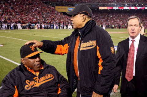 SAN FRANCISCO, CA – DECEMBER 23: Former San Francisco Giants Willie McCovey (L) and Willie Mays (R) on the field prior to the last regular season game at Candlestick Park between the San Francisco 49ers and the Atlanta Falcons on December 23, 2013 in San Francisco, California. (Photo by Stephen Dunn/Getty Images)