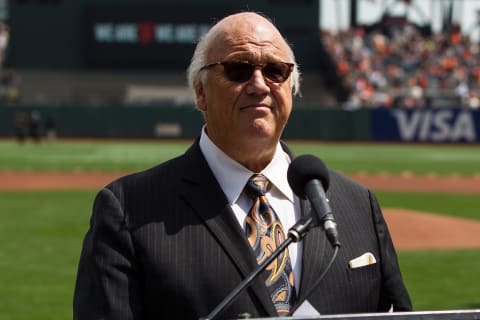 Hall of Fame broadcaster Jon Miller announces the lineups before a game between the SF Giants and the Los Angeles Dodgers in 2016. (Photo by Jason O. Watson/Getty Images)